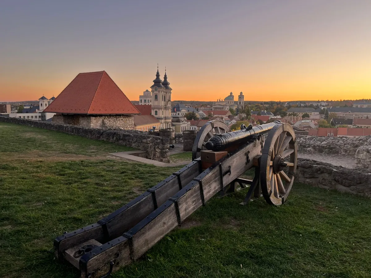Cannon on the fortress walls above Eger at sunset